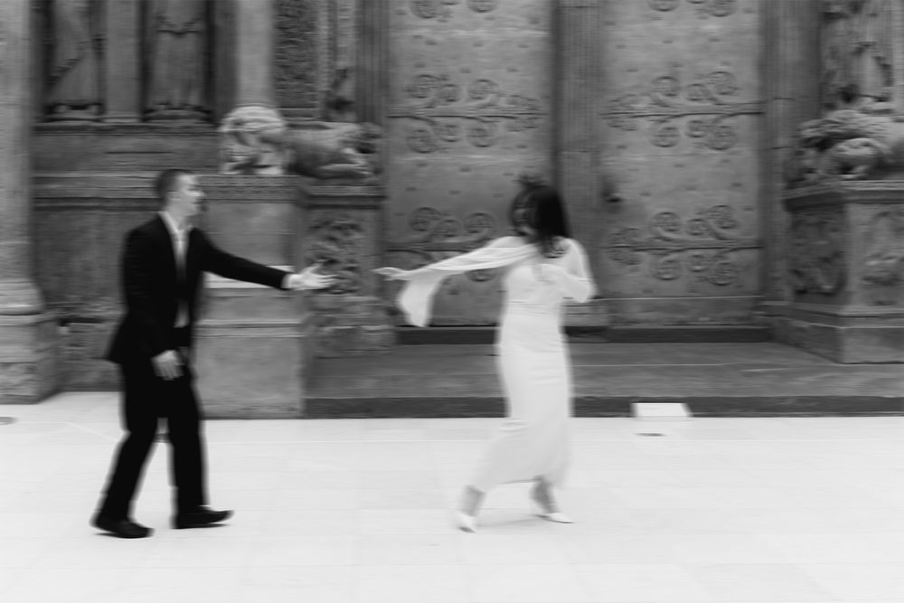 A sequence of black and white photos showing a couple dancing together in an elegant ballroom setting.