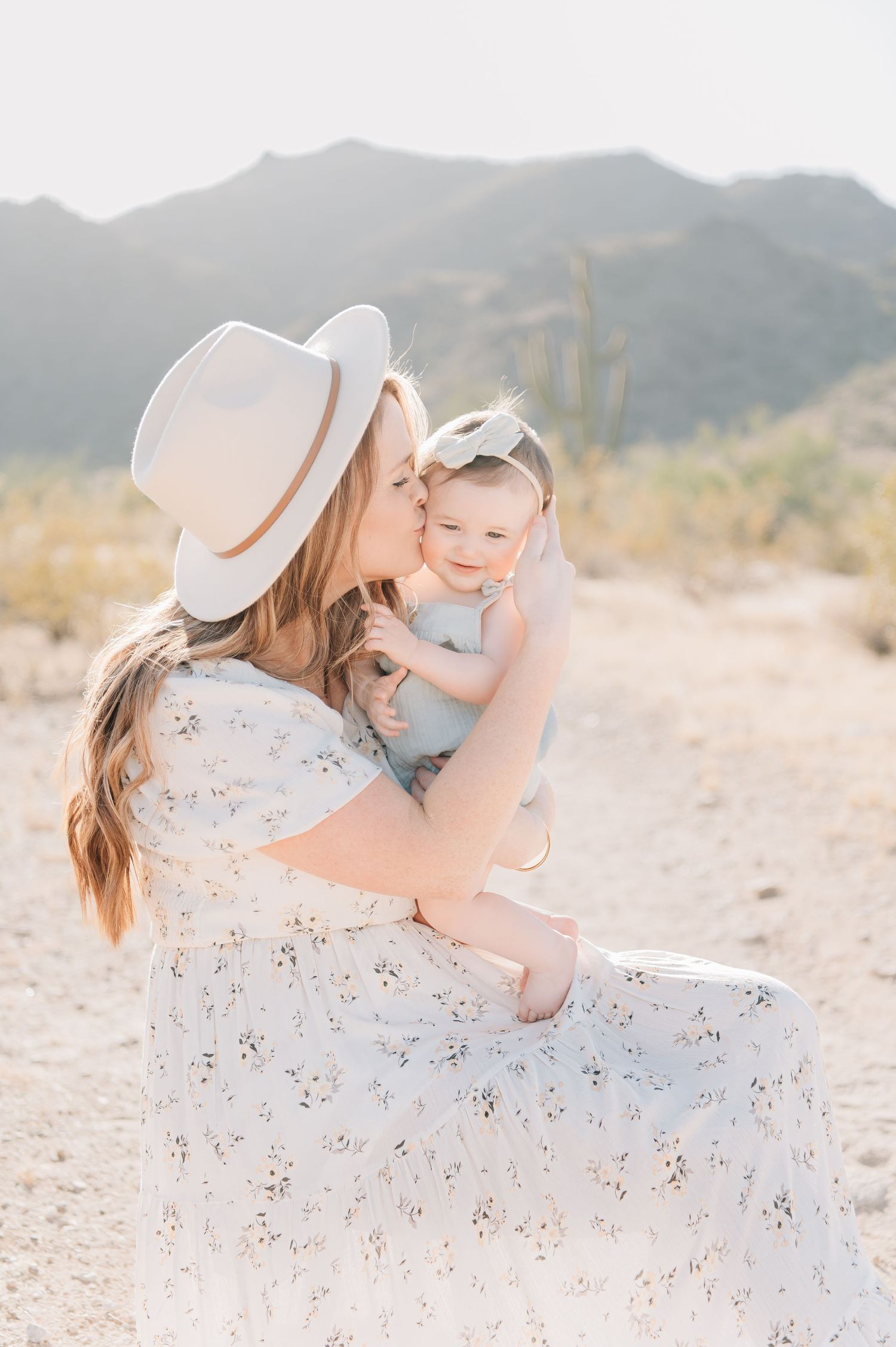 Arizona mom giving sweet baby kisses in the Desert at Photos