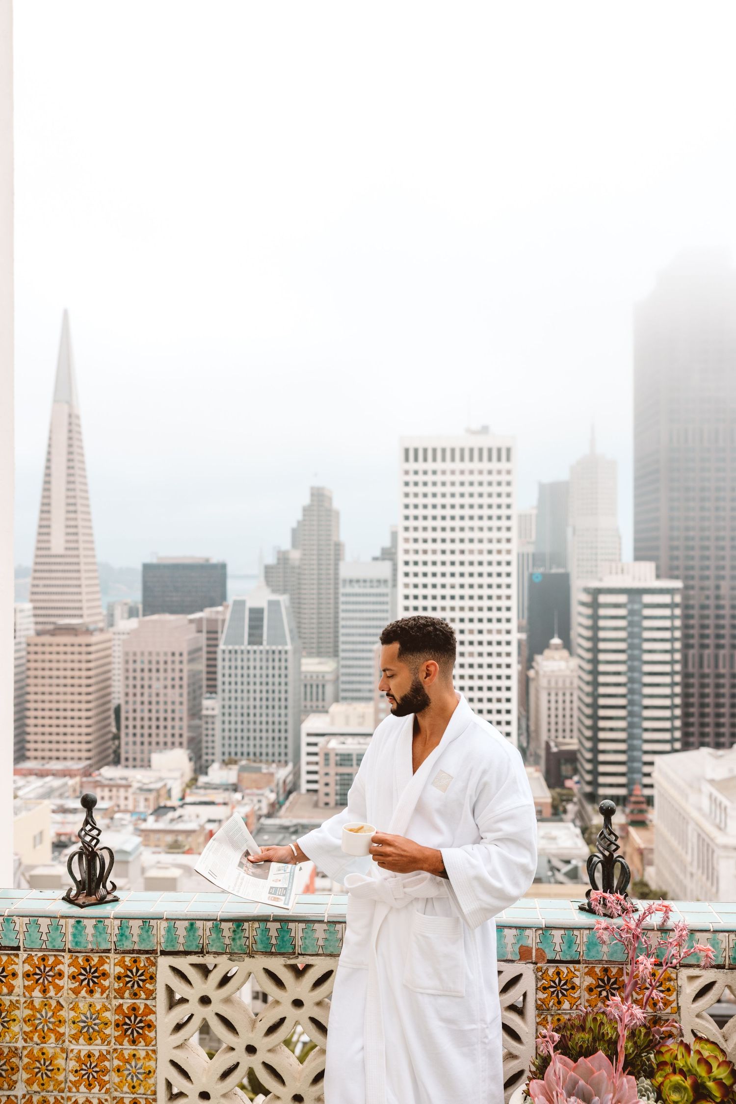 Photo of Trey Krogh on the Fairmont San Fransisco penthouse balcony in San Francisco, California