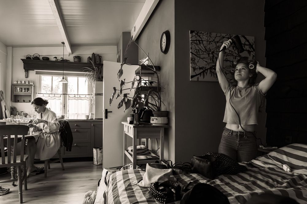 Black and white photo series showing movement and dance in an indoor space with natural light.