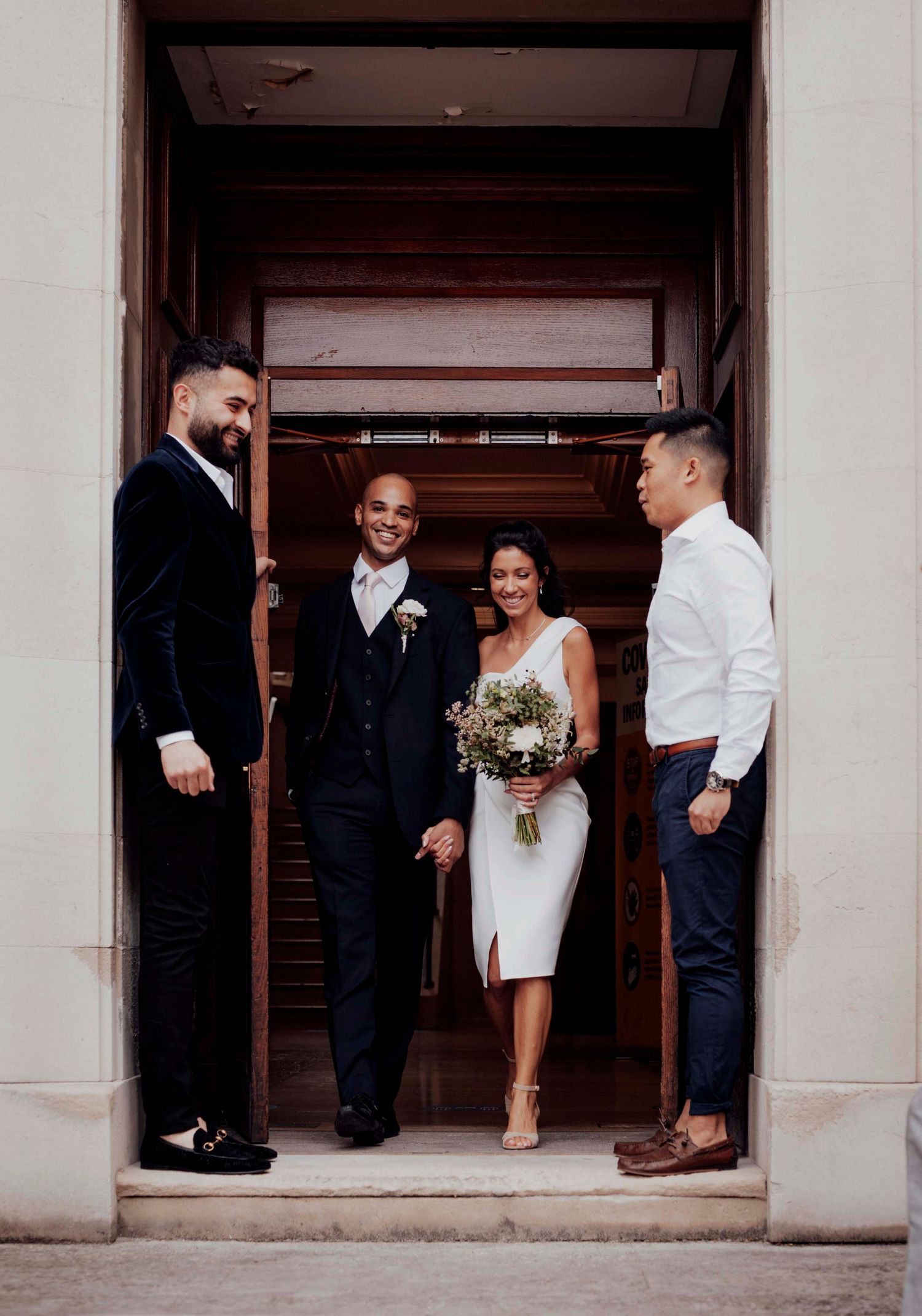 just married couple with friends