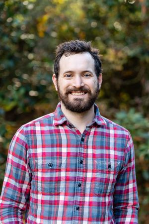 Man smiling for a photo.