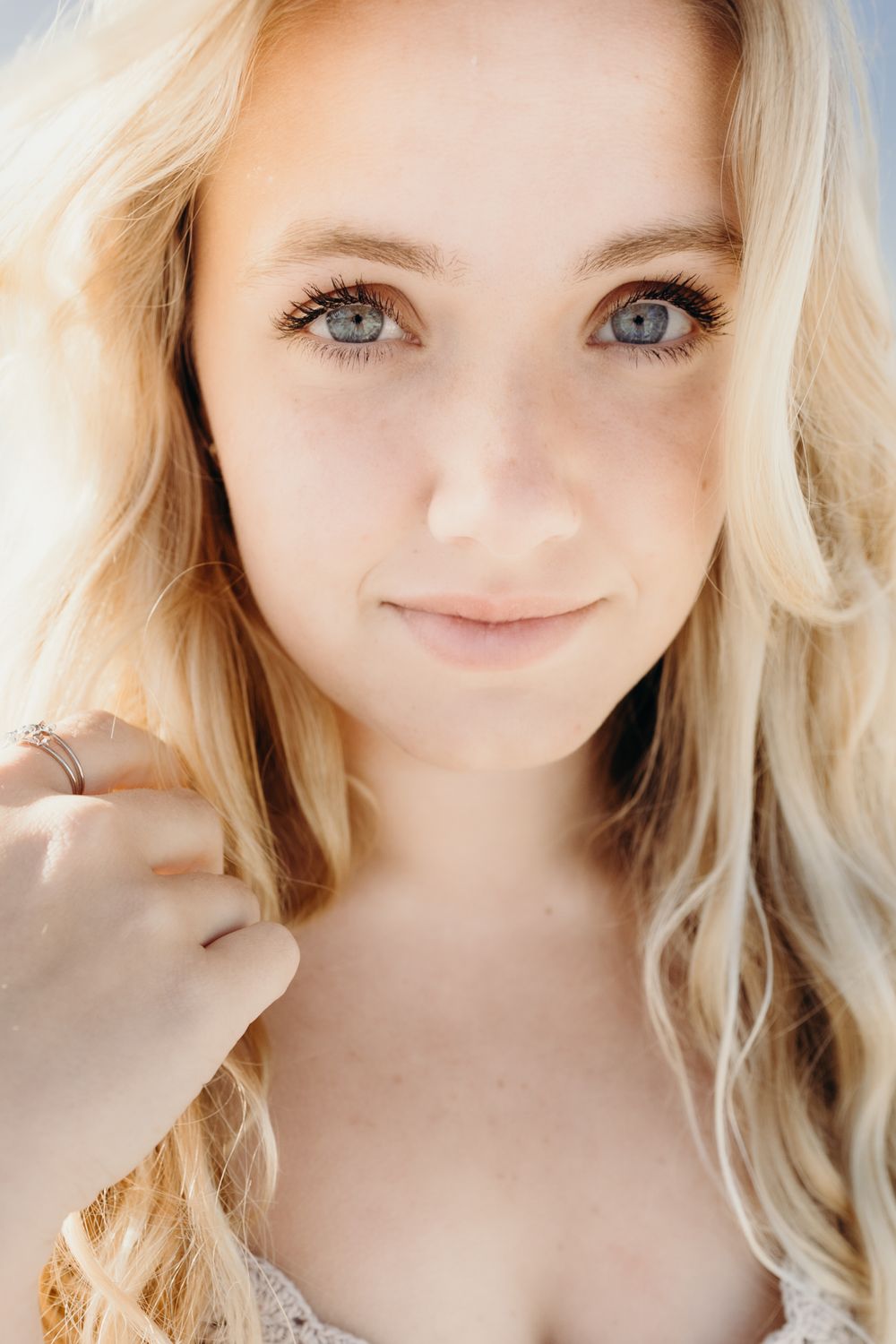 Close up portrait with soft natural lighting and blonde hair.