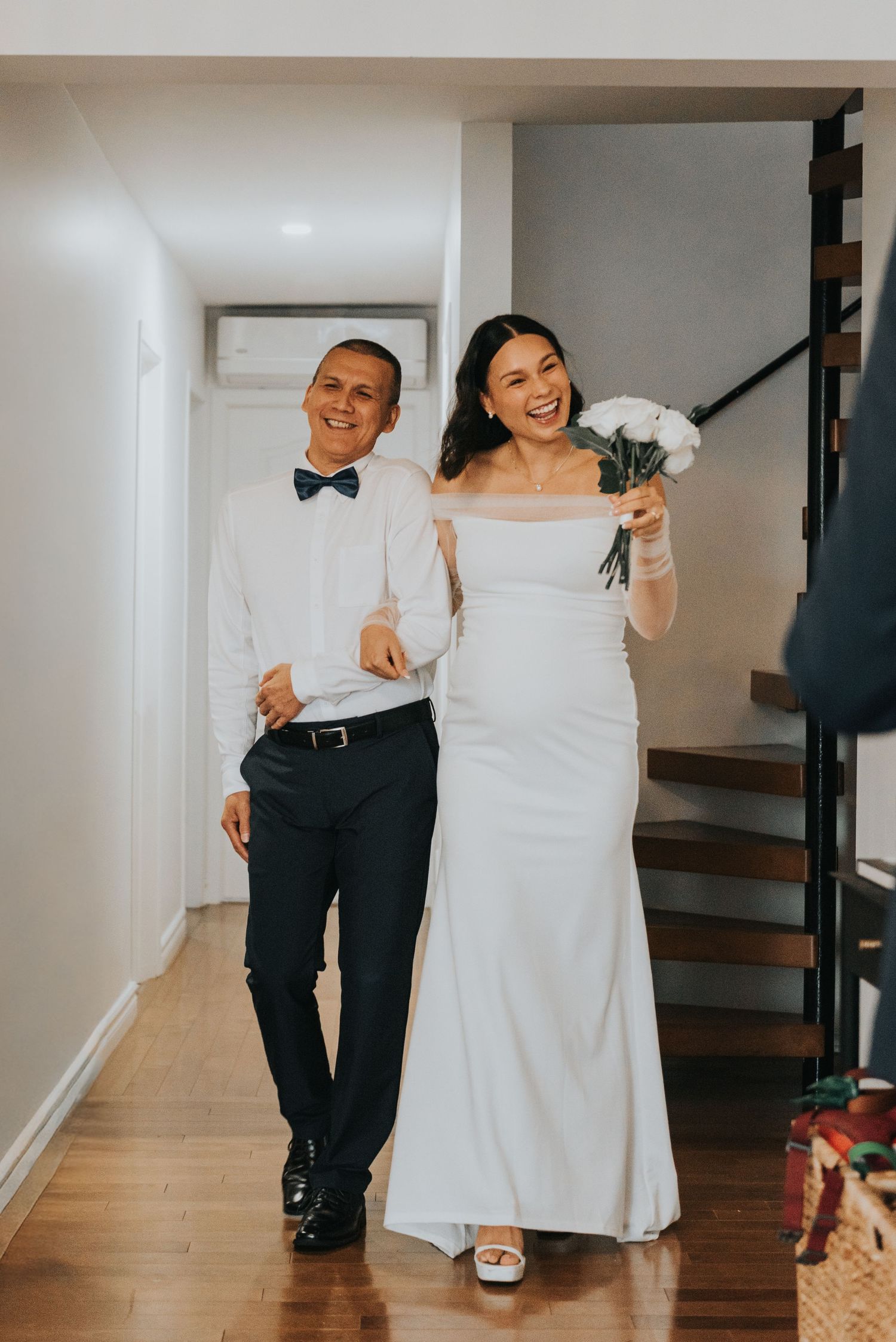A playful series of photos showing a couple in formal attire dancing together in a hallway.
