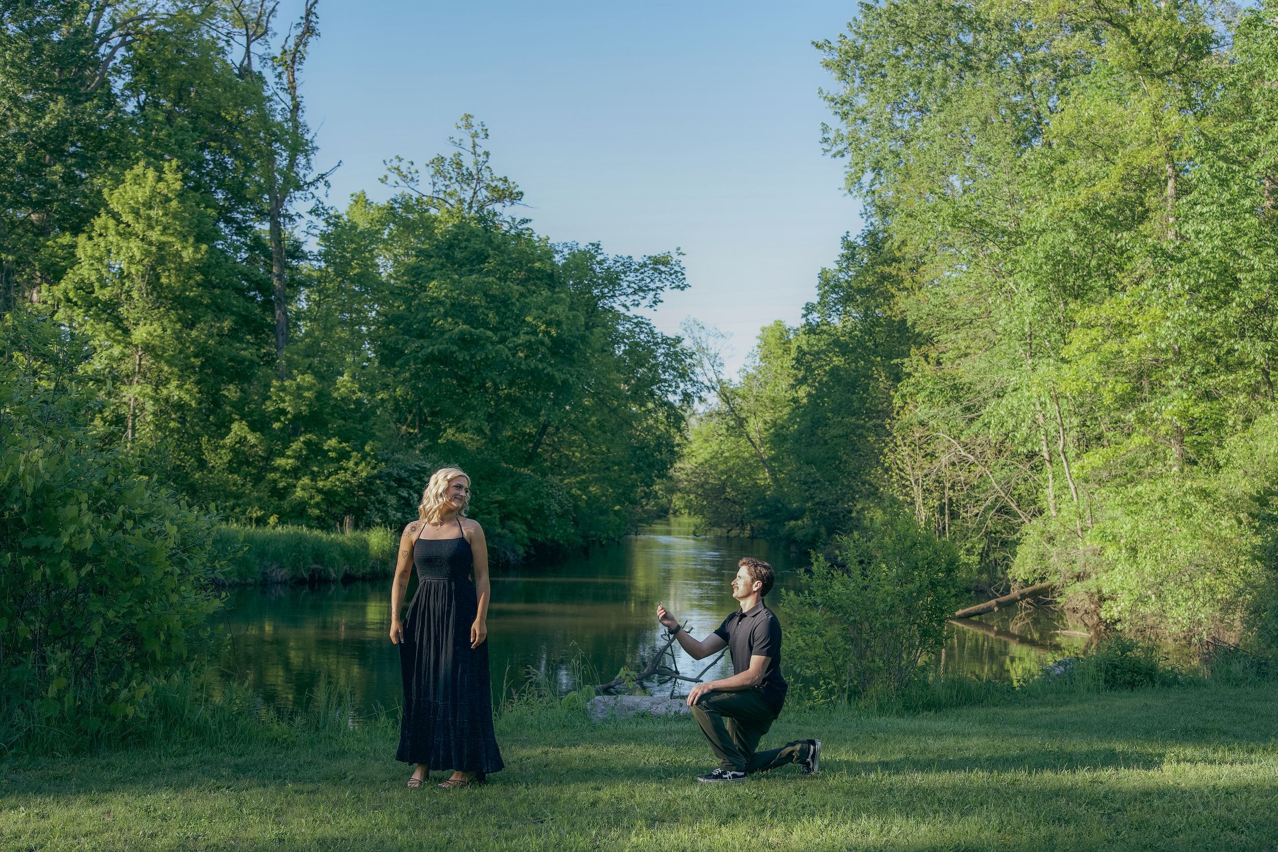 A series of outdoor photo session shots in a lush green park setting with natural lighting and foliage.