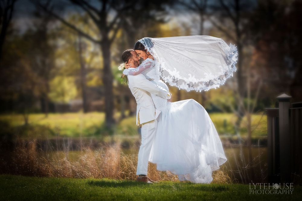 A series of romantic wedding photos taken in a park showing flowing white dress movement against natural backgrounds.