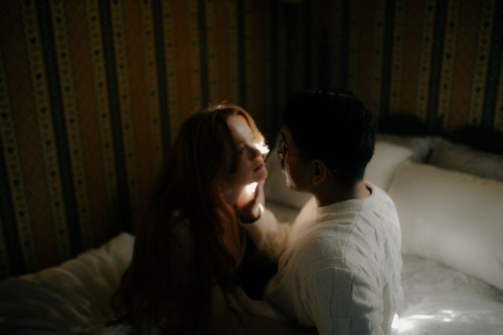 Atmospheric sequence of intimate moments captured in dark moody lighting.