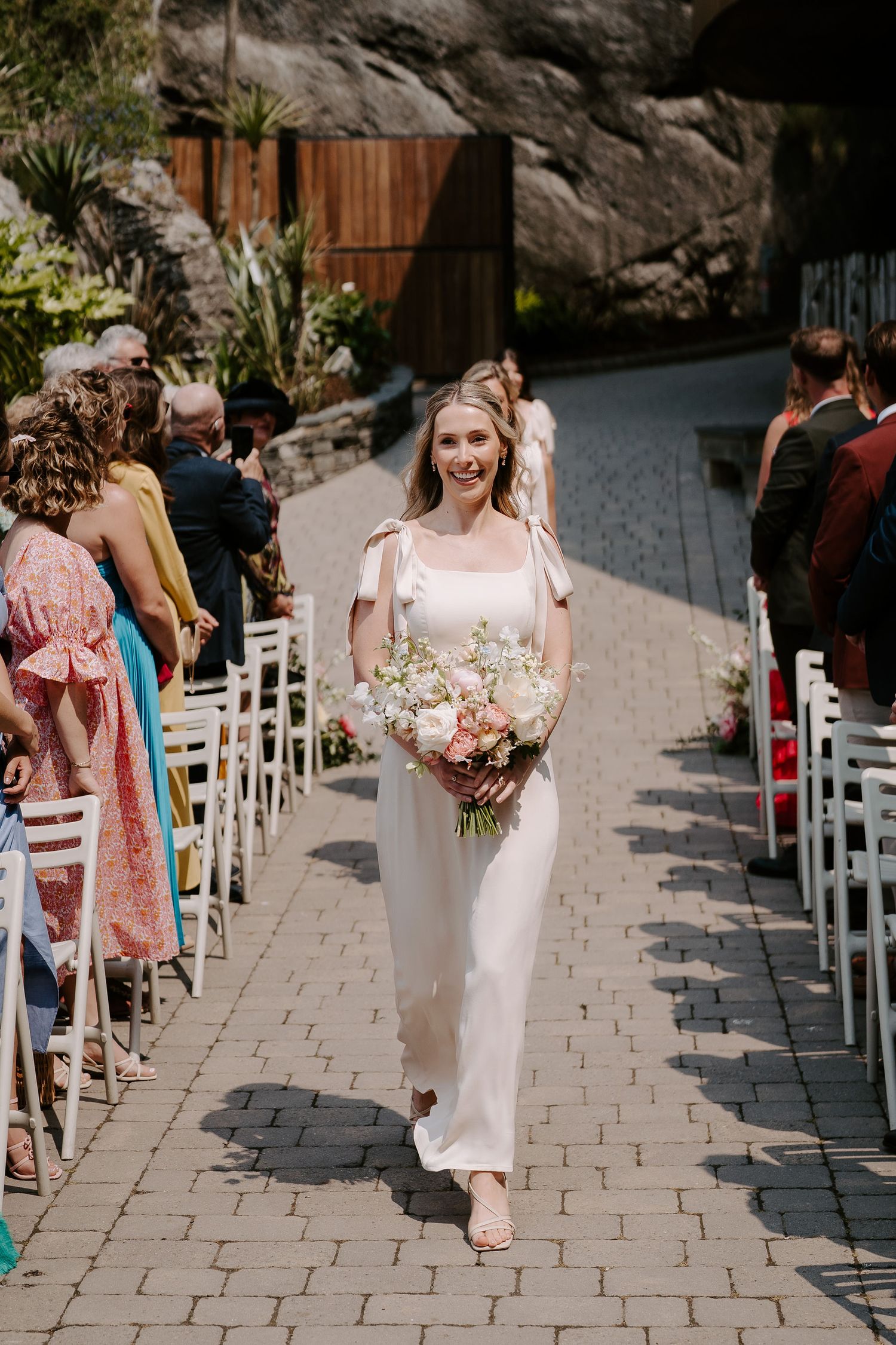 Tunnels Beach Wedding Venue in North Devon, Bridesmaids walking down the aisle