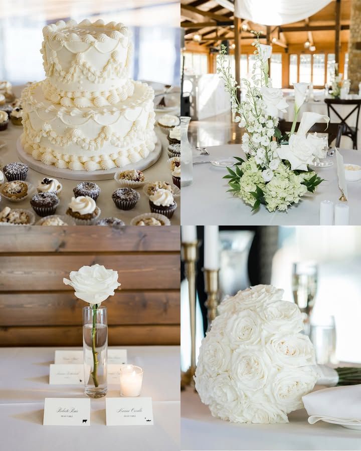 Elegant white wedding reception decor featuring floral centerpieces, place cards, and a textured tiered cake on wooden tables.