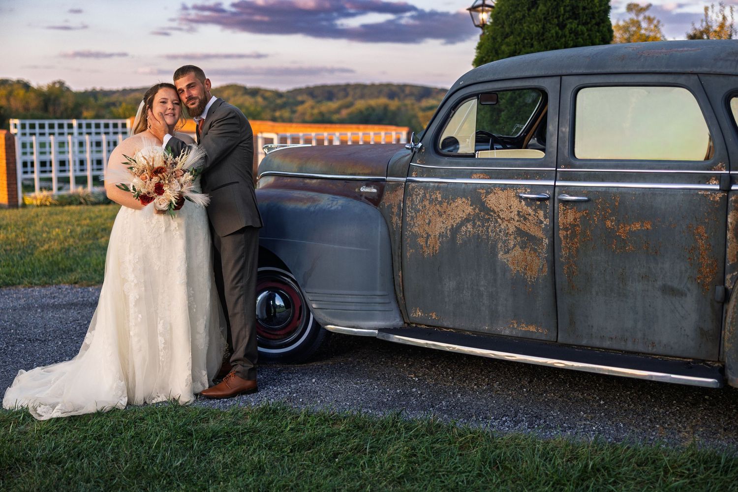 frederick maryland wedding photographer Sunset wedding photography session with classic car and scenic mountain backdrop.
