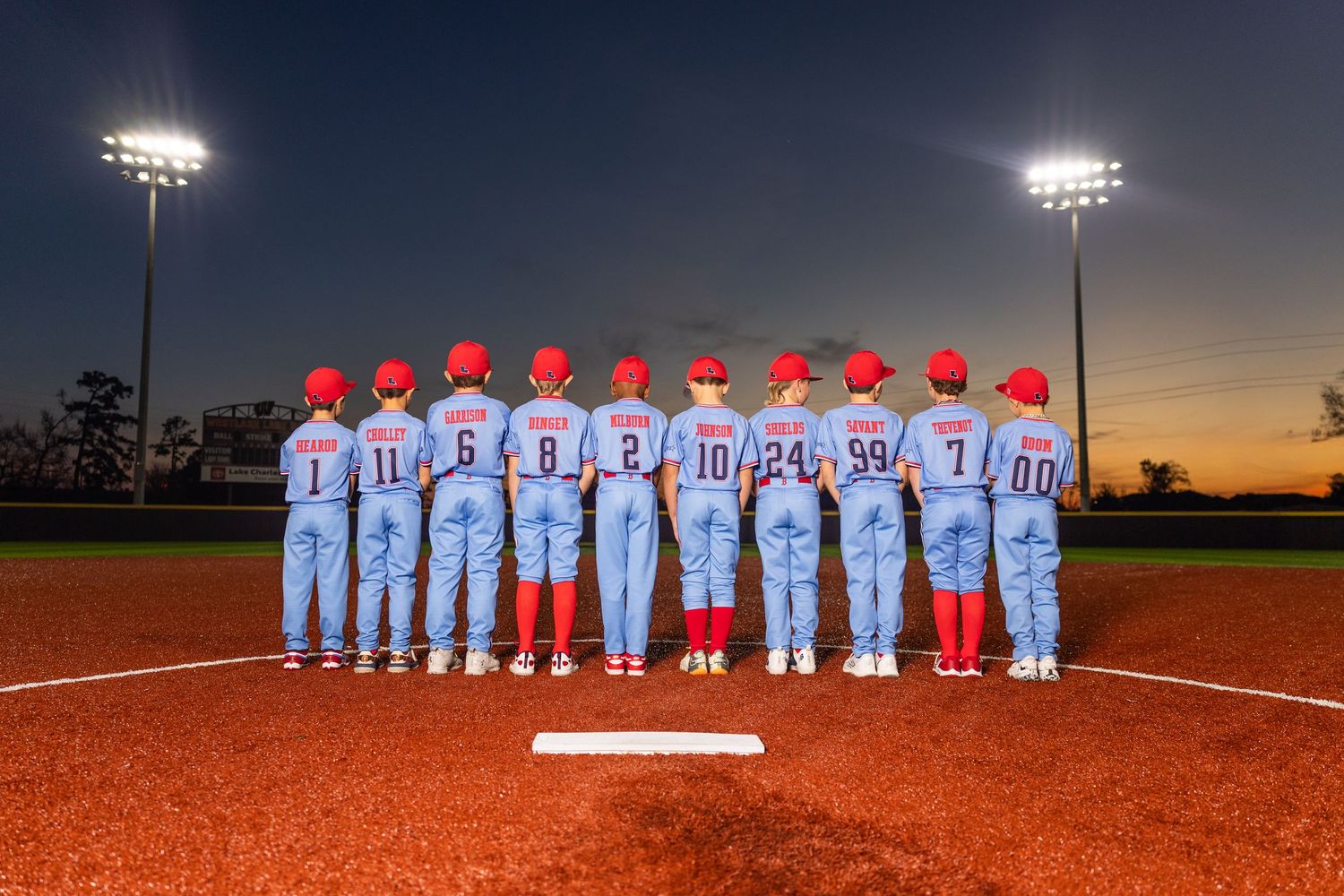 Youth baseball portrait using off-camera flash during a team media day in Lake Charles, LA. Ballistics at Westlake High School Field