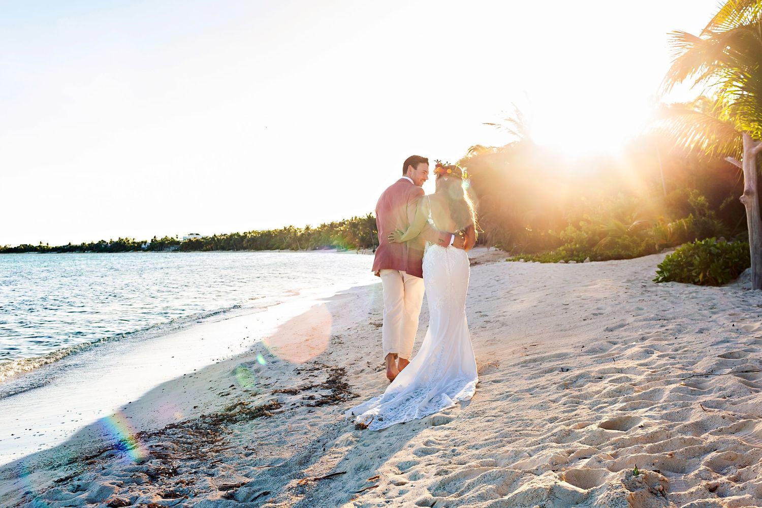 Bride and groom at sunset during Jashita Boutique Hotel wedding in Tulum.
