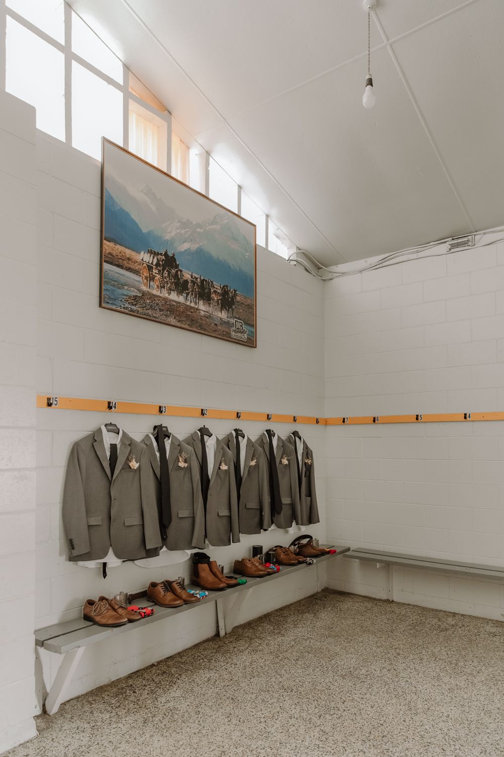 details photo of west coast wedding, groom and his groomsmen get ready in a fun and unique way