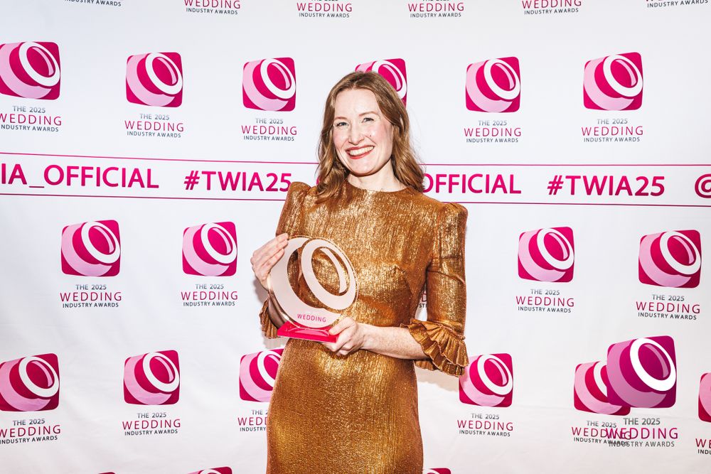 Chelsea Cannar National UK Wedding Photographer of the year 2025 Twia Winner Photo with TWIA Trophy
