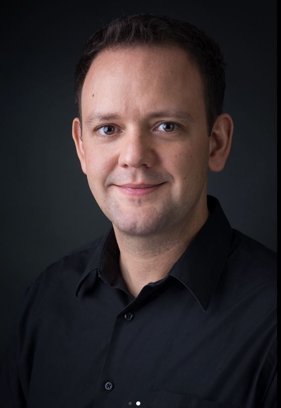 Picture of a man who left a 5 star review for headshots taken by professional photographer in East Tennessee