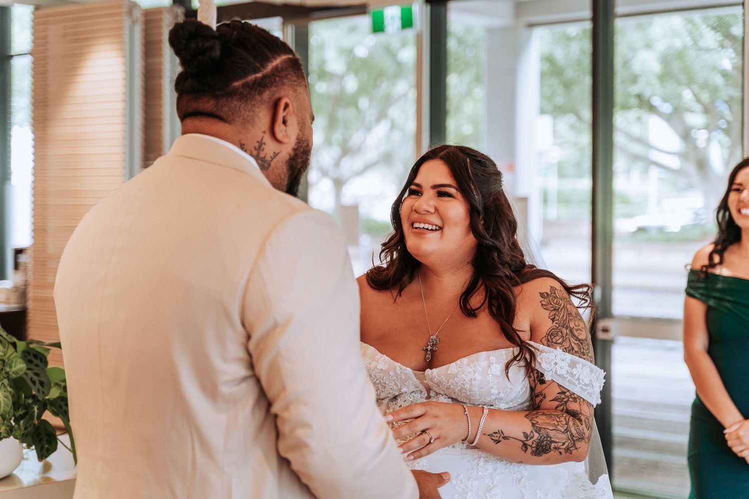 A joyful wedding ceremony moment captured in natural light.
