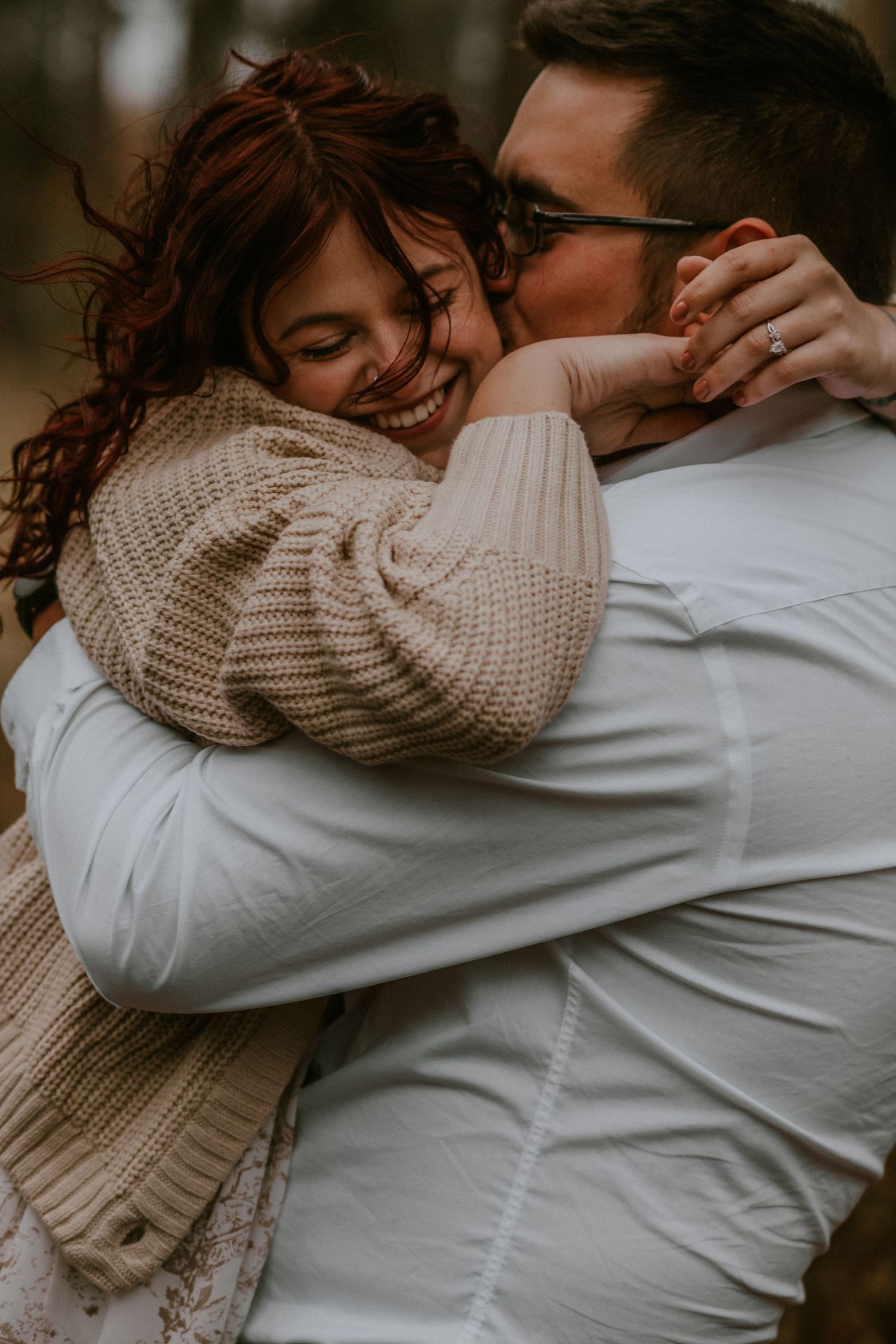 A romantic moment captured in a series of intimate embraces, showing a couple in cozy knit sweaters.