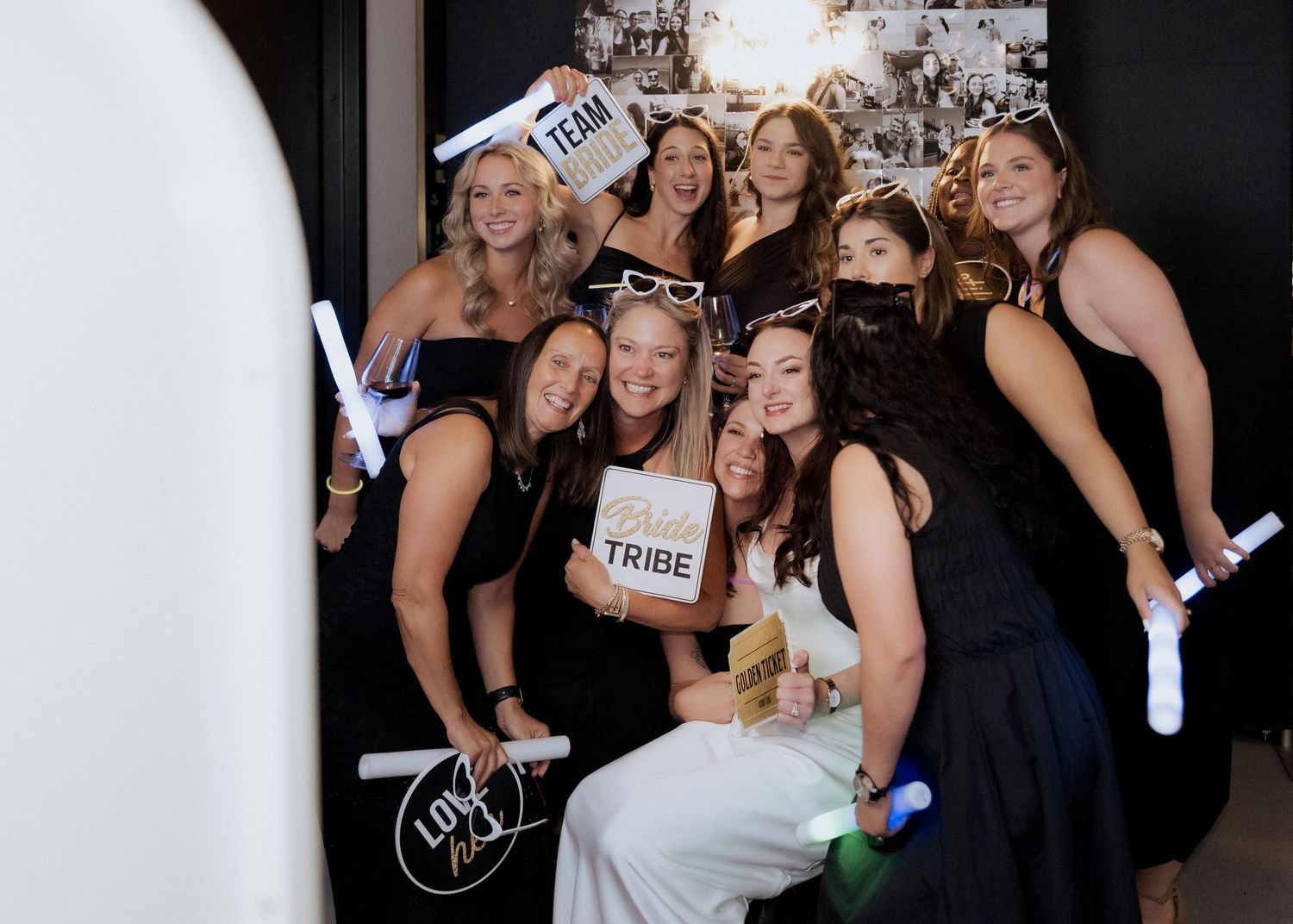 bride and her friends pose in photobooth at modern wedding at Tire Shack brewery in Moncton New Brunswick