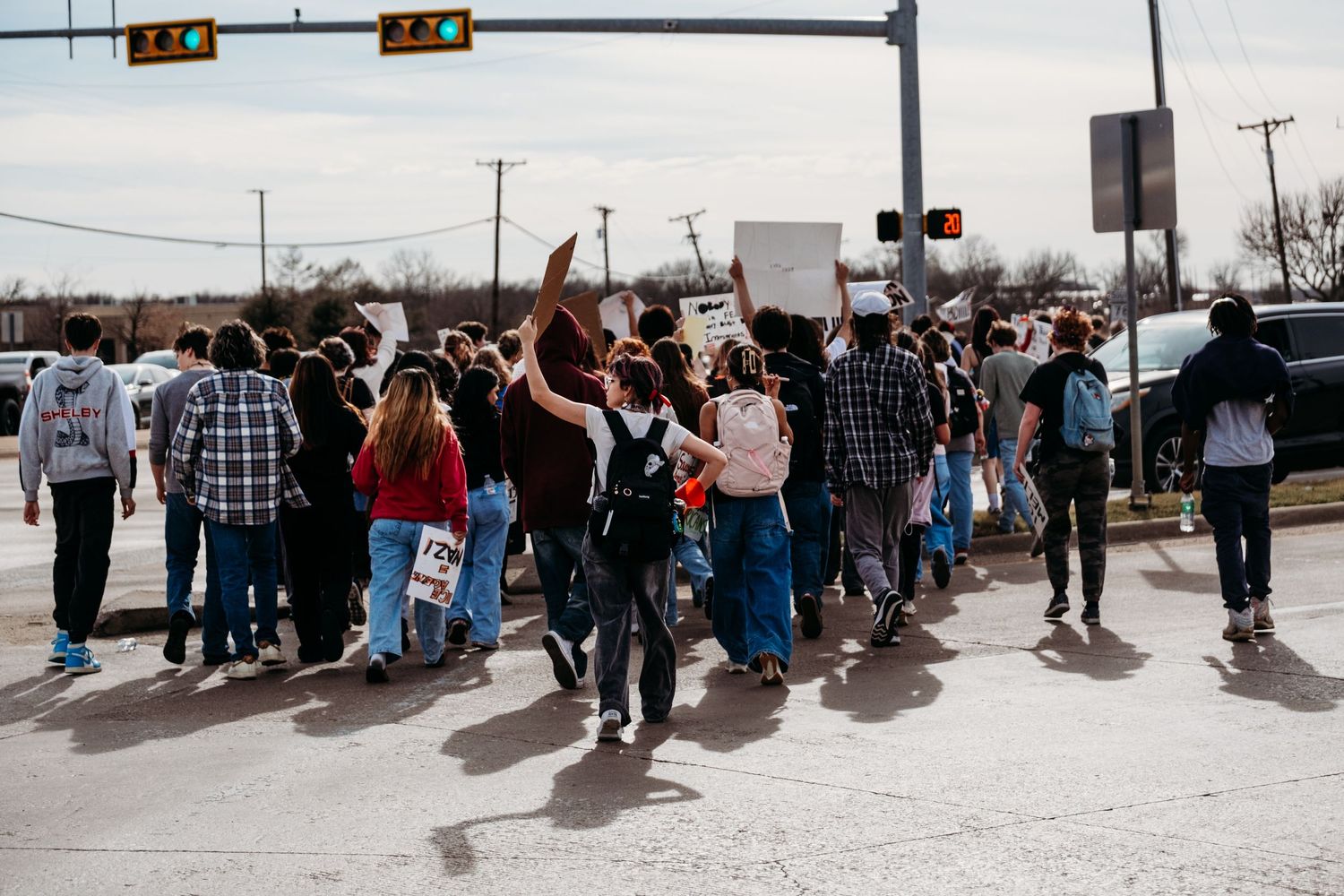 A group of students in North Texas participating in a school walk-out to protest ICE in February 2026