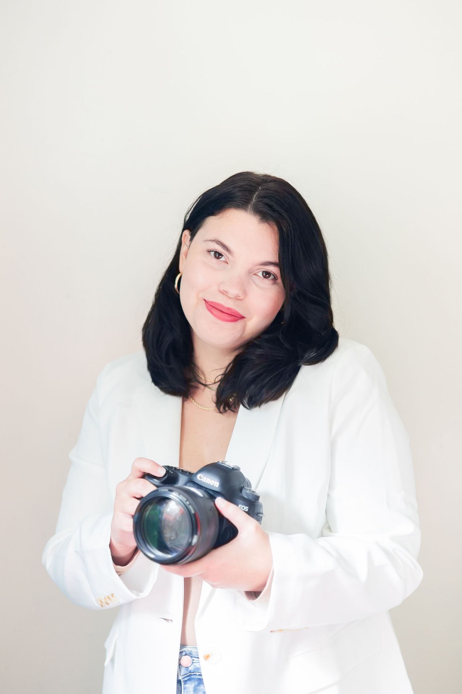Four sequential photos show someone in a white blazer posing with a dark teacup against a light background.