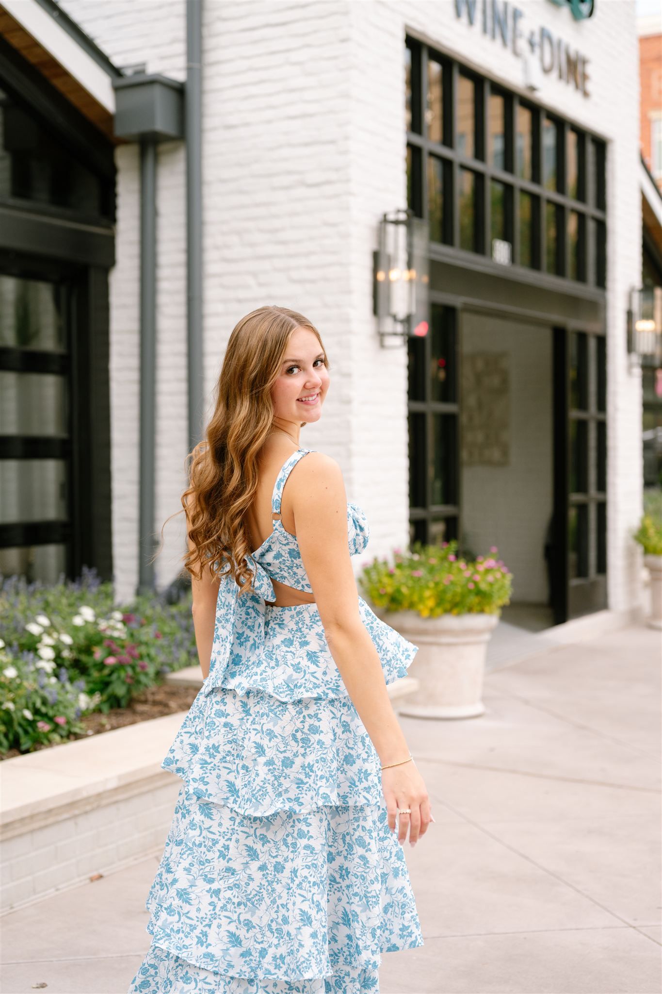 College Park High School girl posing for senior portraits in The Woodlands, Texas