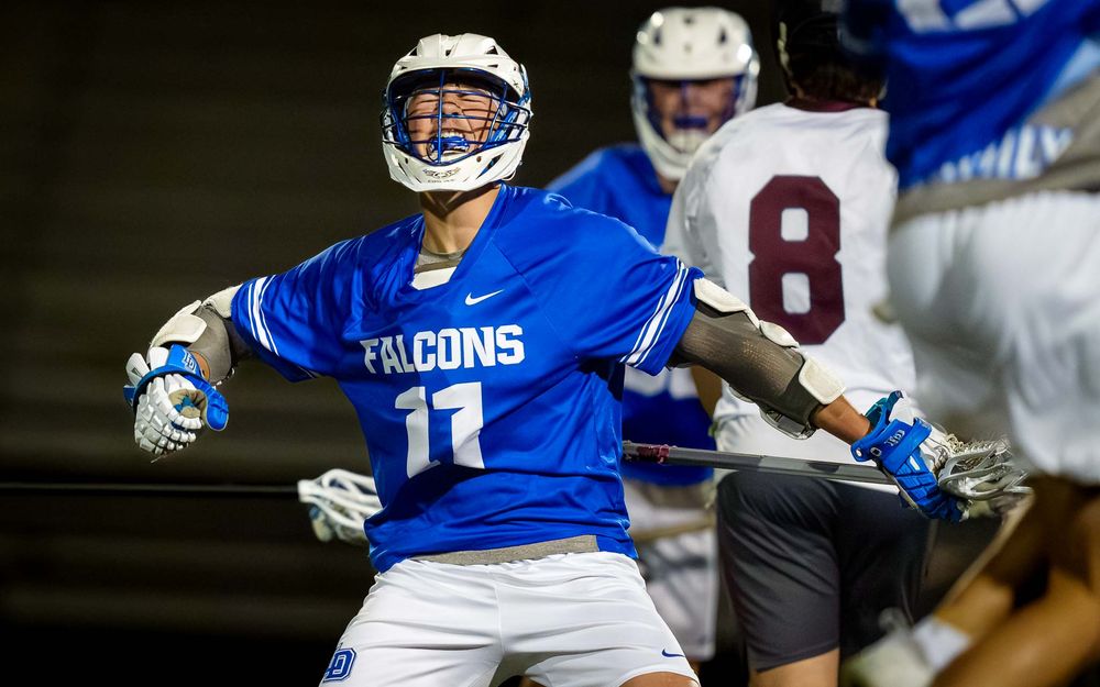 Lower Dauphin Falcons #11 in action against an opponent during the 2026 Mid Penn Lacrosse Championship by SportsFox Photography, Hershey PA.
