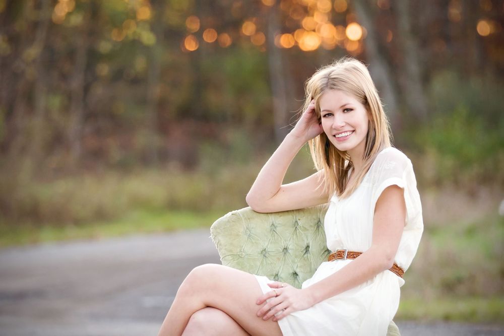 Senior portrait near Brighton Michigan; girl in nature with cinematic vibes by South Lyon, MI photographer