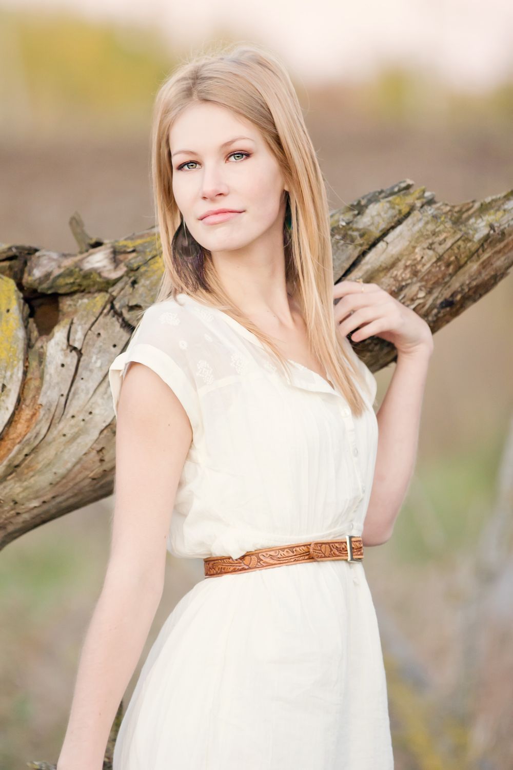Modern senior portrait near Brighton Michigan; girl with model style and soft cinematic light by South Lyon, MI photographer