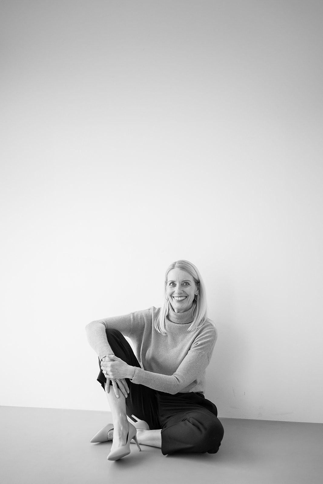 Warm natural-light portrait of wedding celebrant Simone Gori from LovelyWords, captured by MaxwellArt Photography during a wedding.
