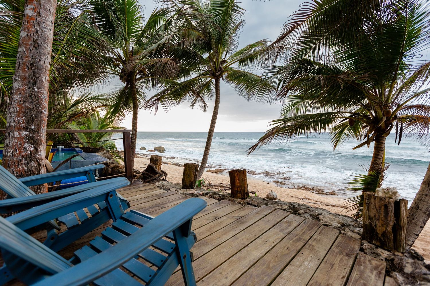 Beach view and beachfront seating area. Beach house in Vega Baja, Puerto Rico.
