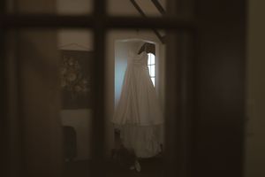 Dark atmospheric interior shots of wedding venue with dramatic lighting.