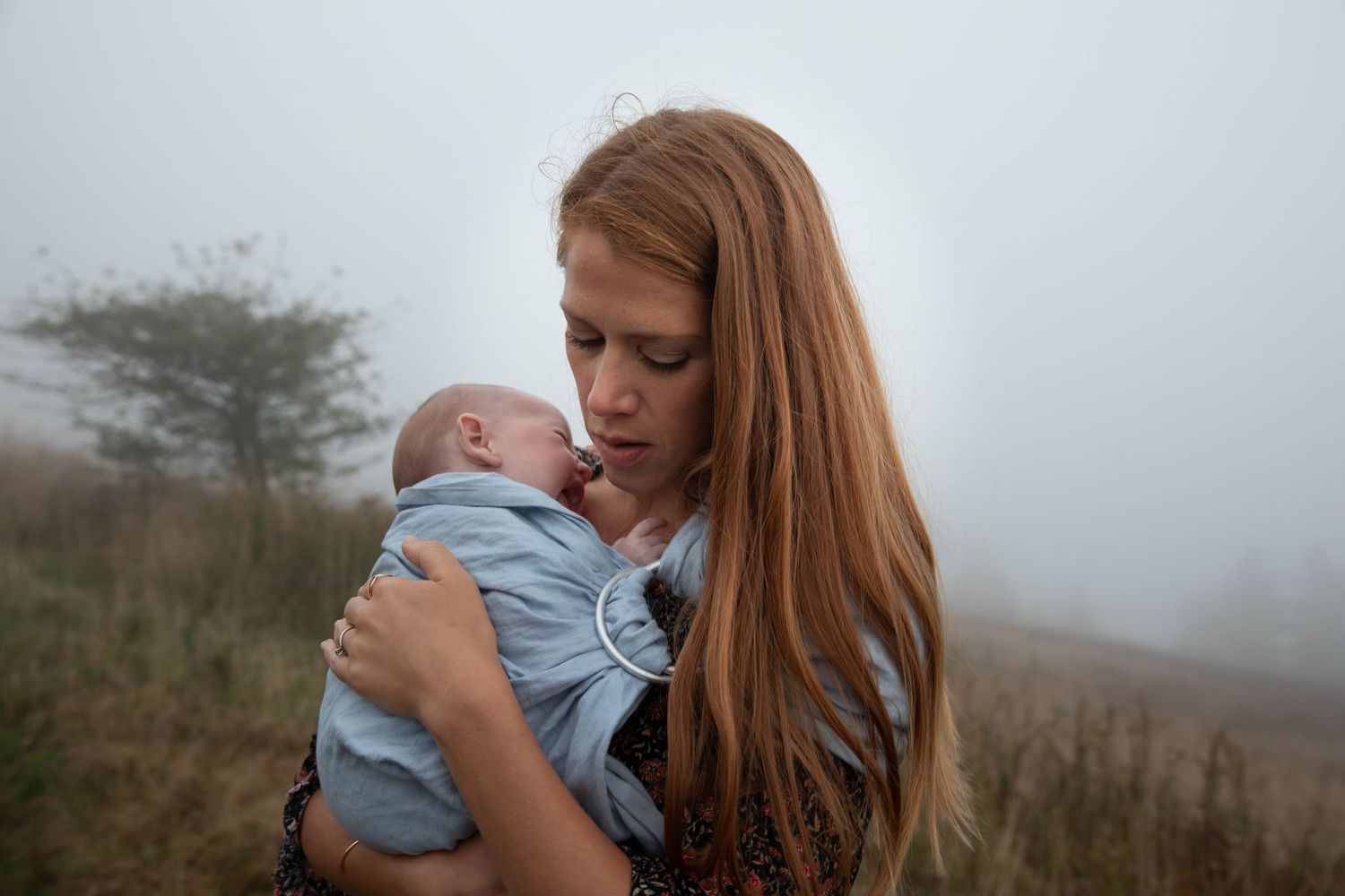 Photo of a mother and son on a mountaintop at sunset for a family photo shoot on Whitetop Mountain in southwest Virginia