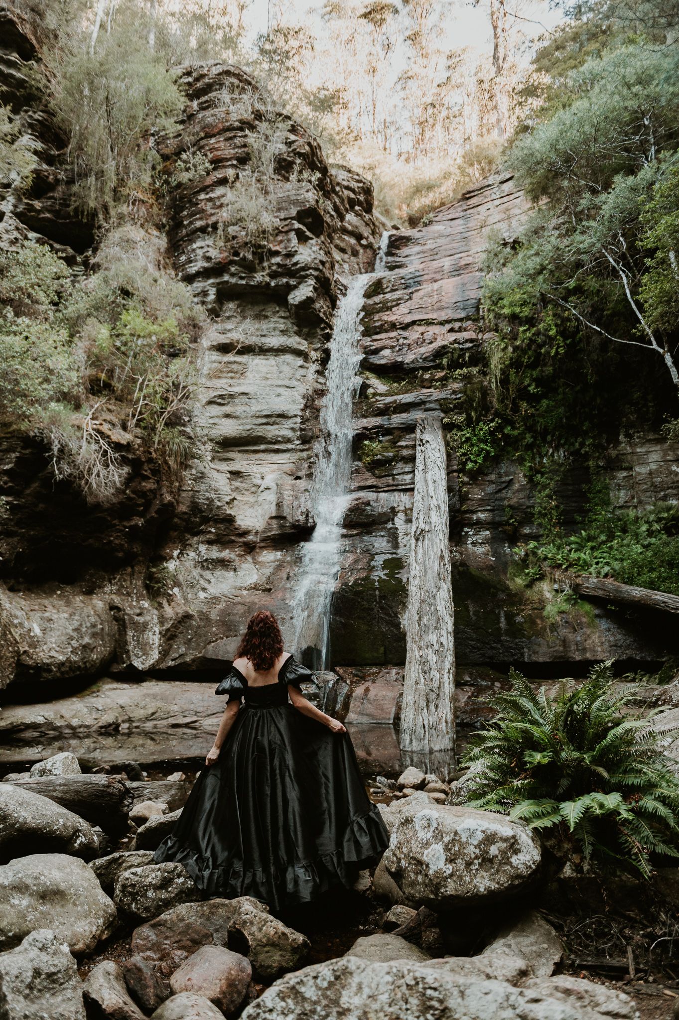 self portrait in a beautiful gown at snug falls, tasmania. taken by wedding, elopement and family photographer Joss Jensen photography