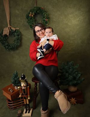 A series of five holiday portraits with festive decorations and nutcracker props against a dark green backdrop.