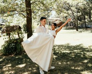 Wedding photo sequence showing couple dancing and twirling in a sunlit garden setting.