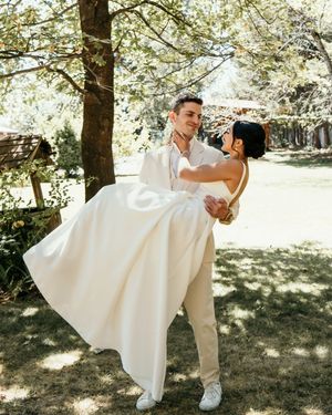 A sequence of playful wedding photos showing a couple dancing and twirling in an outdoor garden setting.