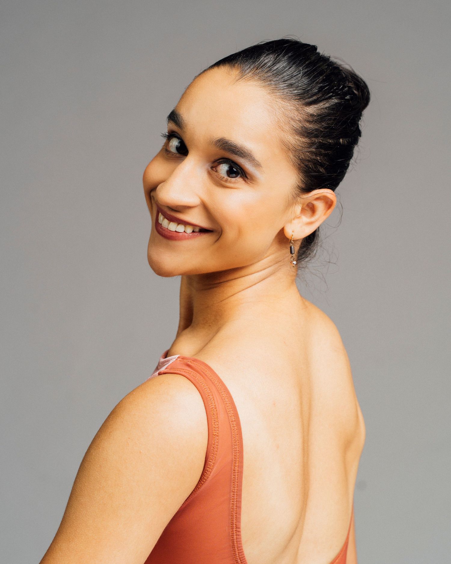 Professional ballet dancer headshot Chicago photographer creating clean audition-ready images for latina ballerina dancer