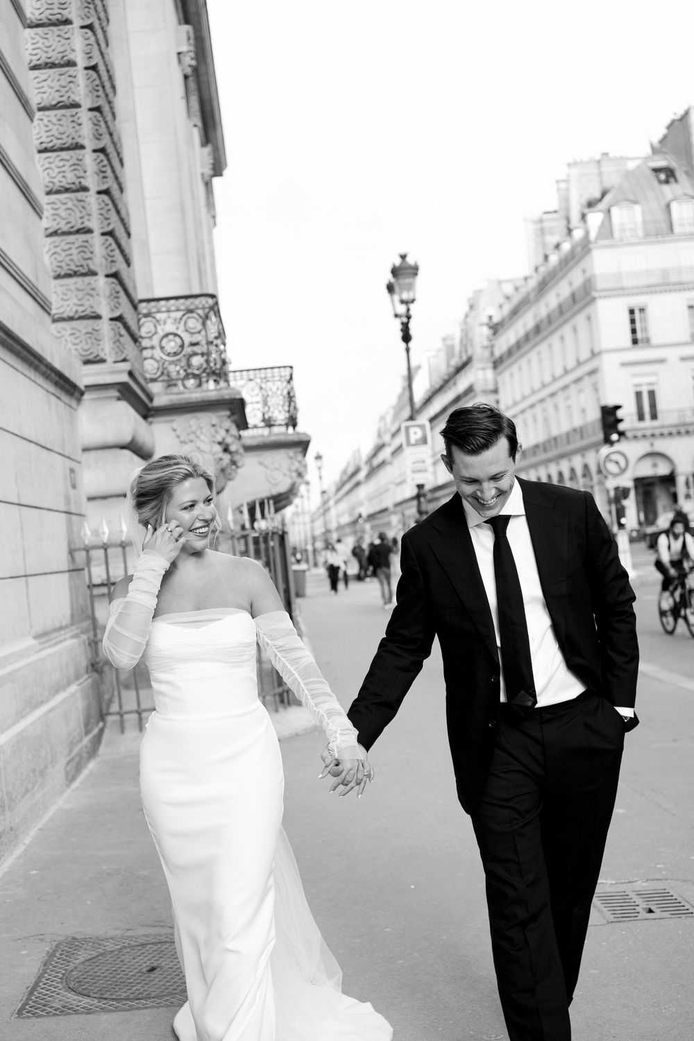 A sequence of candid wedding photos showing a couple walking street photos. Paris editorial elopement photographer.