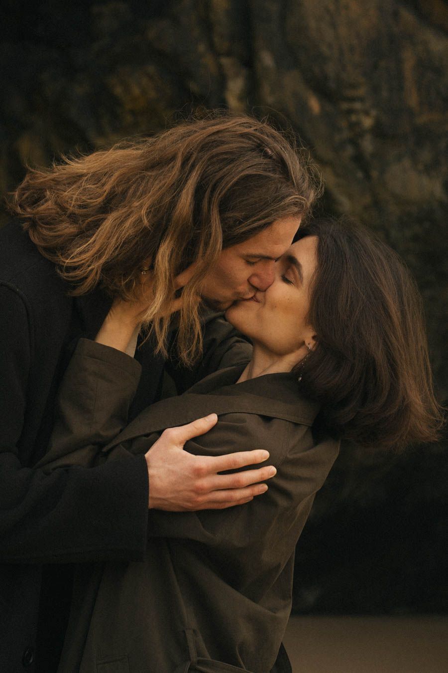 Couple kissing on the beach