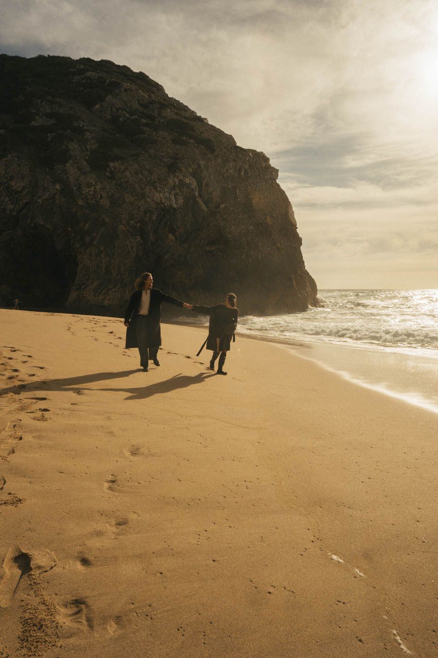 Couple walking on the beach