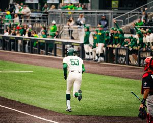 Oregon Ducks baseball player number 53 runs the bases during a game at PK Park in Eugene.