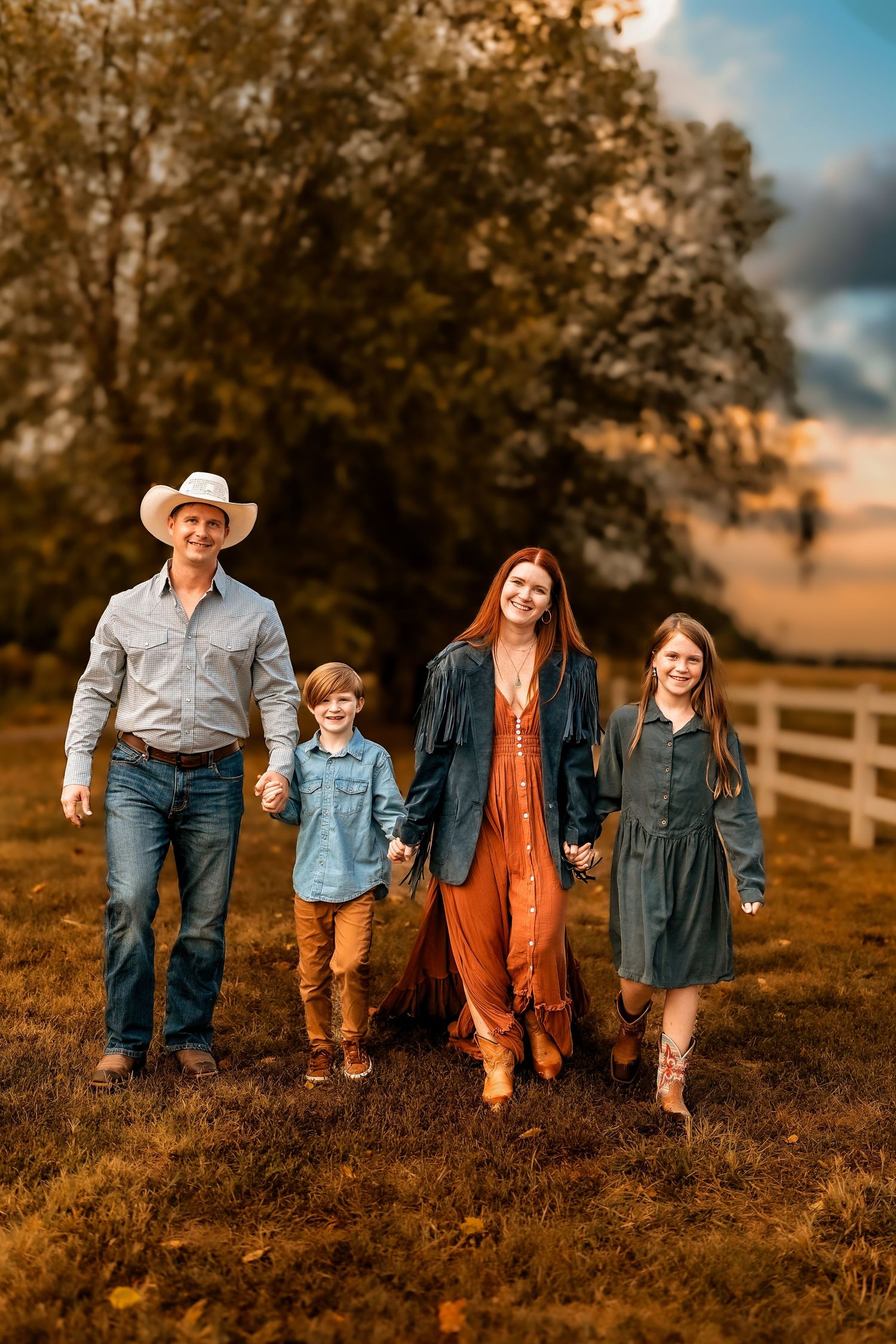 Clarksville TN family photographer capturing family in warm golden hour light with earth tones and natural connection