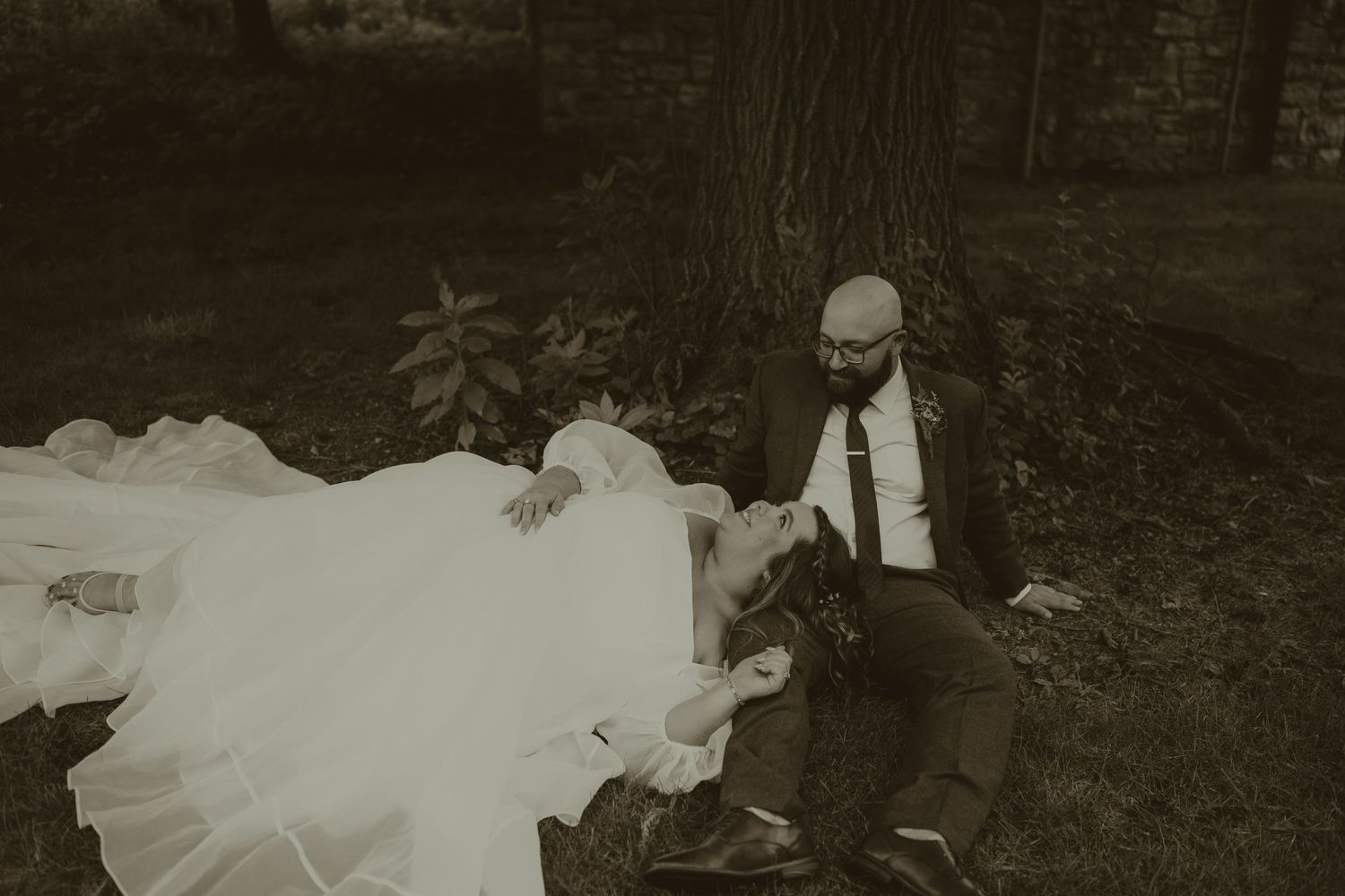 A fairytale wedding in Dayton with Kristen & Vince while relaxing in the grass on a humid summer day.