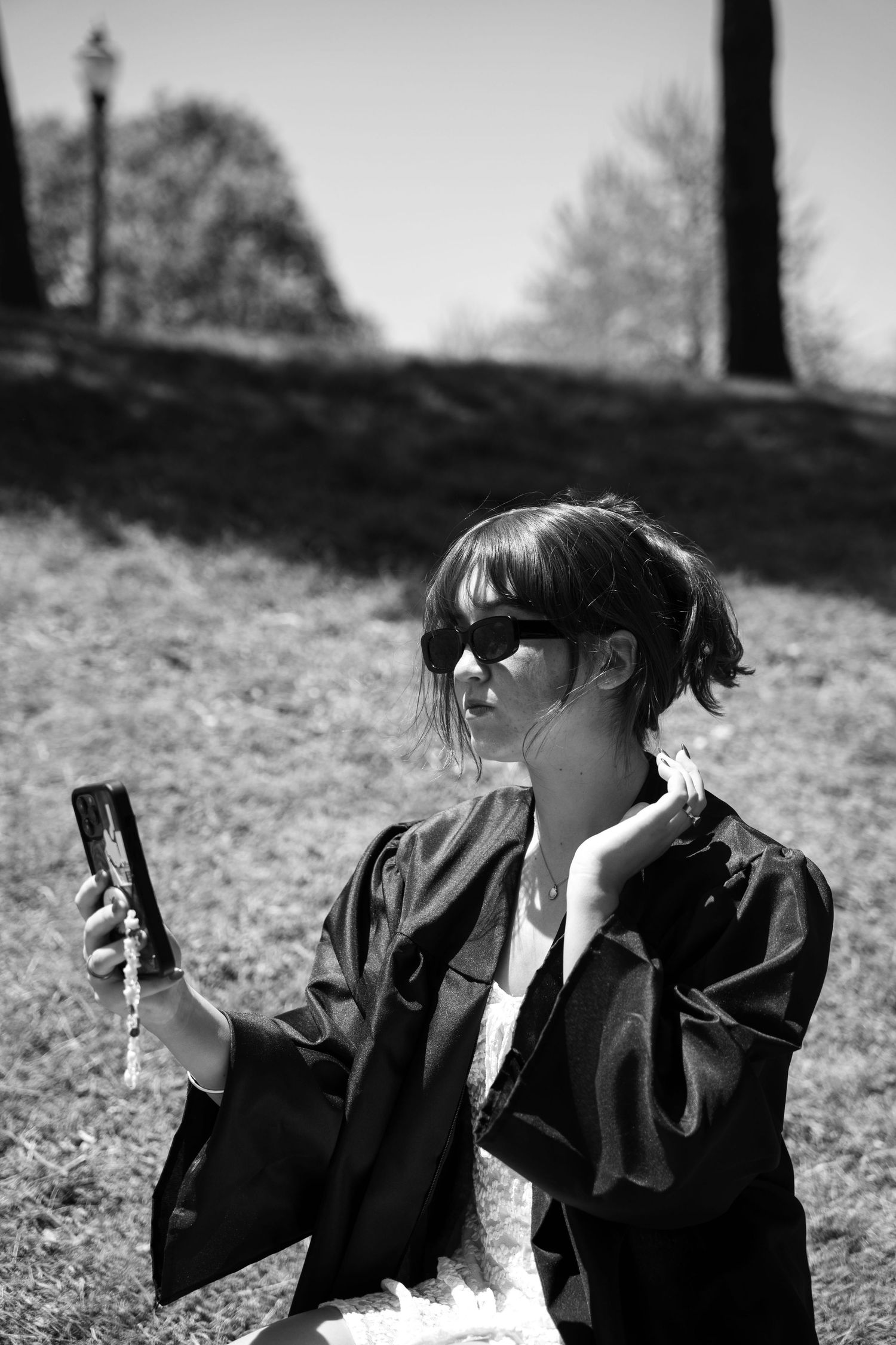 Untraditional black and white Umass Amherst graduation photo, capturing a cool and modern vibe.