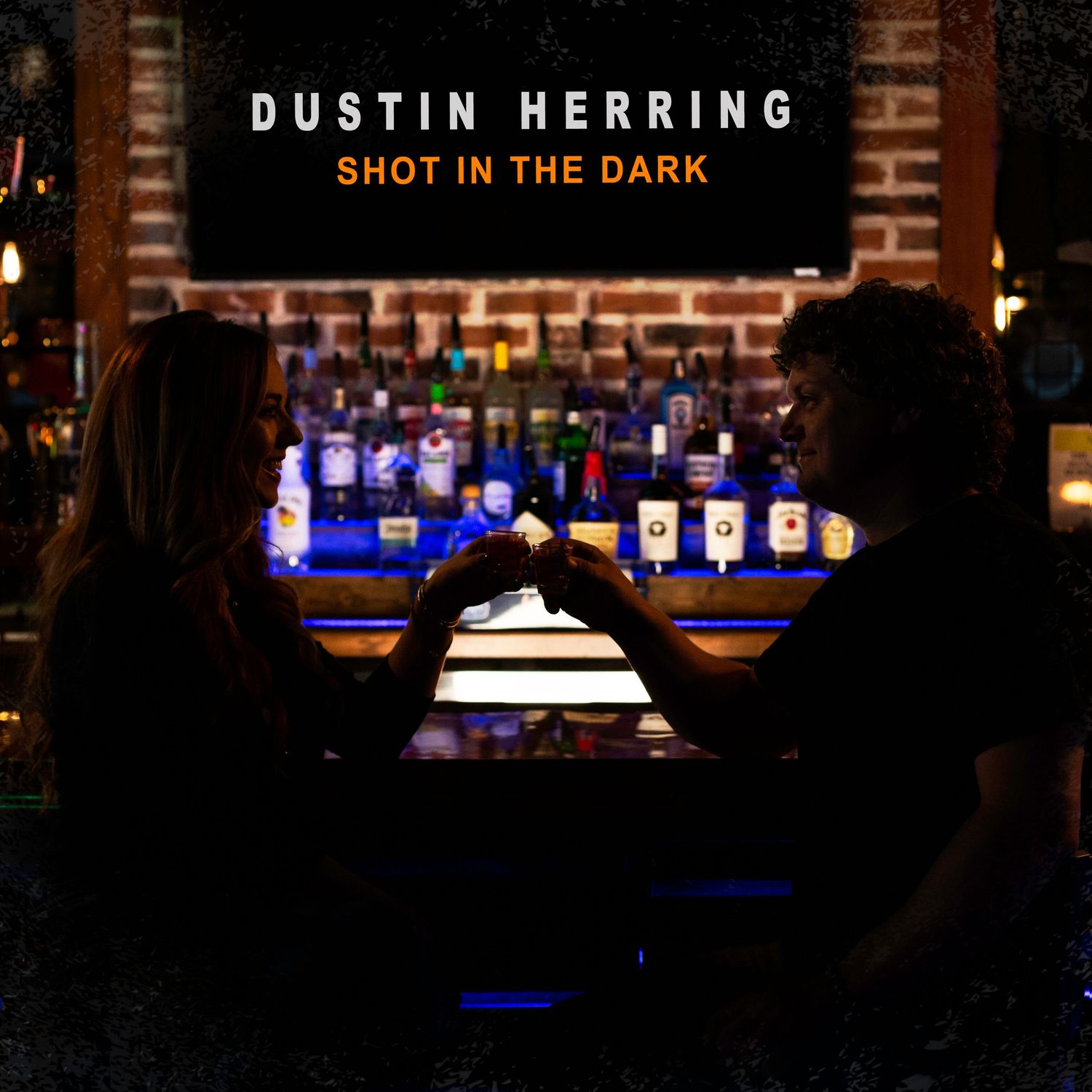Silhouetted figures at dimly lit bar for album cover 'Shot in the Dark' by music artist Dustin Herring.