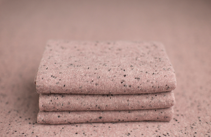 Dusty rose pink with black and brown specs newborn photography wrap/background sample