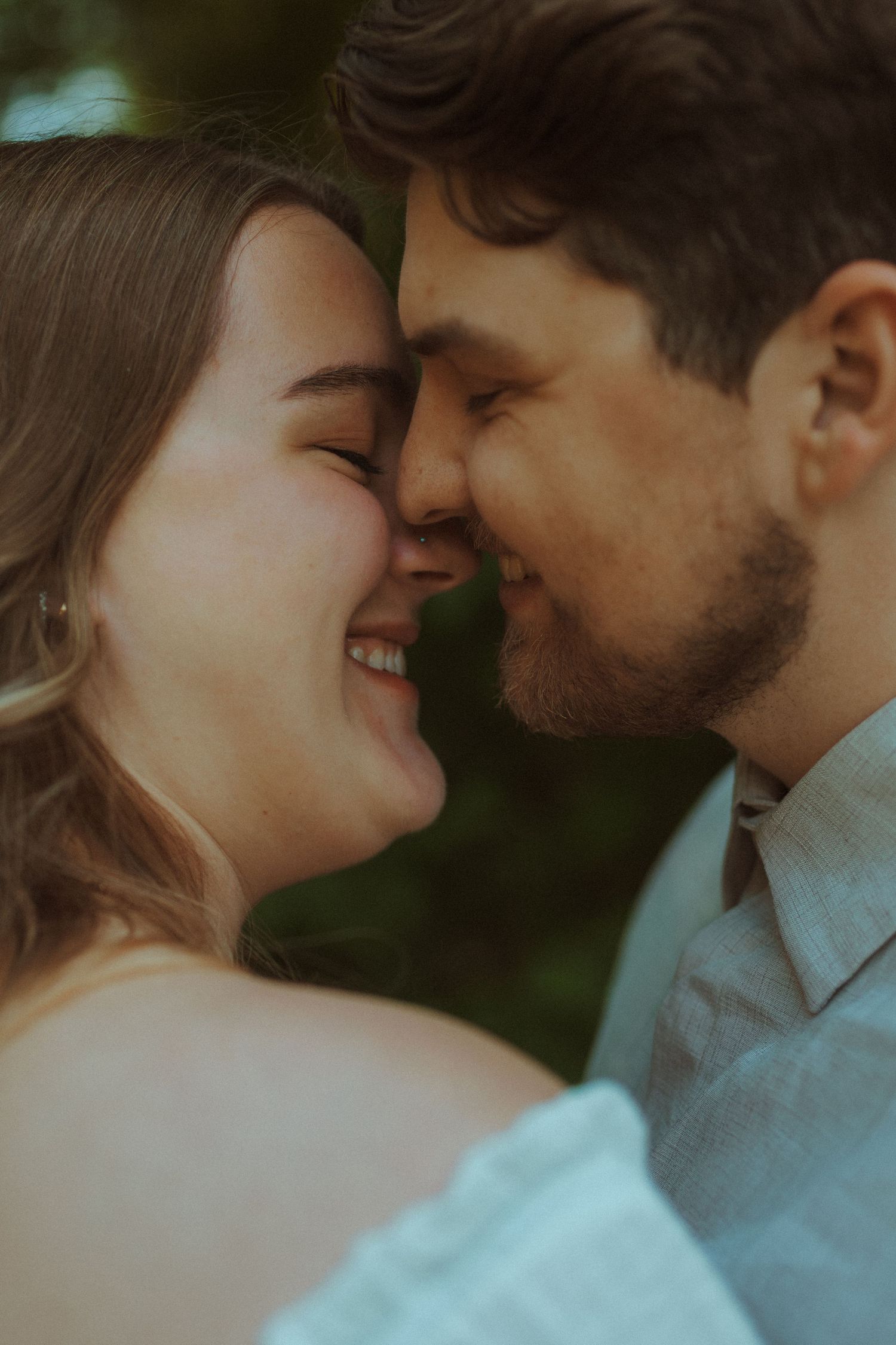 A close-up romantic photo sequence of a couple sharing intimate moments in a soft, natural outdoor setting.
