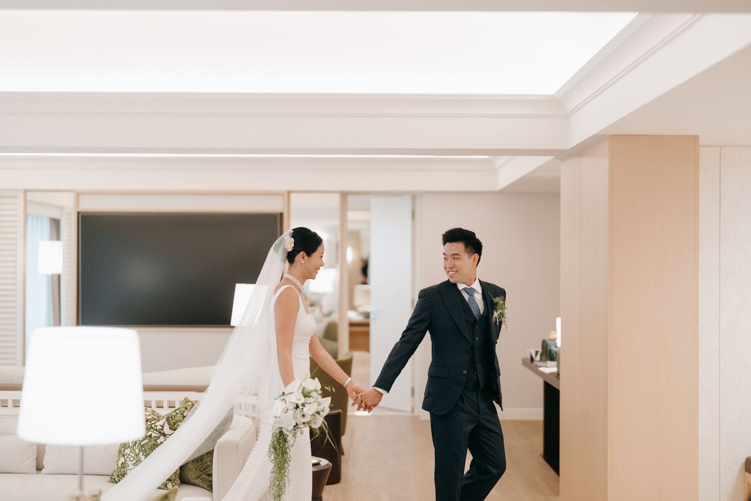 Elegant bridal preparation room with soft natural lighting.