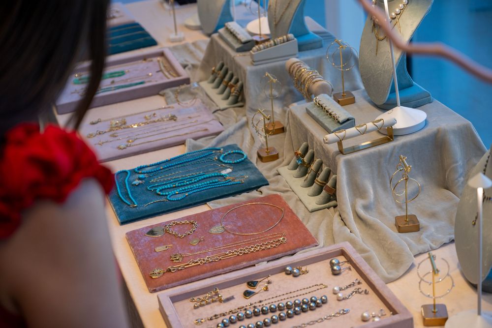 Circuit board components being manufactured on an assembly line with colorful printed elements and metal parts.