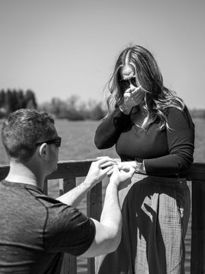 Surprise proposal at Island Lake Orangeville with beautiful sunny skies
